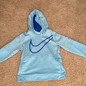 A blue Nike sweatshirt